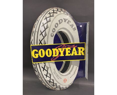 A Goodyear Tyres die-cut double sided enamel sign with hanging flange, heavily restored, 22 x 34". 
