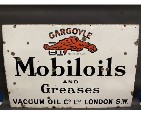 A large Gargoyle Mobiloils and Greases rectangular enamel sign by Patent Enamel, 45 x 30". 