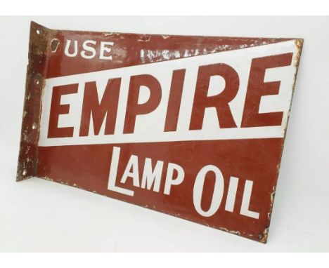 An early and rare double sided enamel sign with hanging flange by Bruton of Palmers Green, advertising to one side Empire Lam