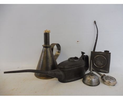 An American conical lamp (Gem MFG Co), two small oilers, one marked Mercedes and two large oilers. 