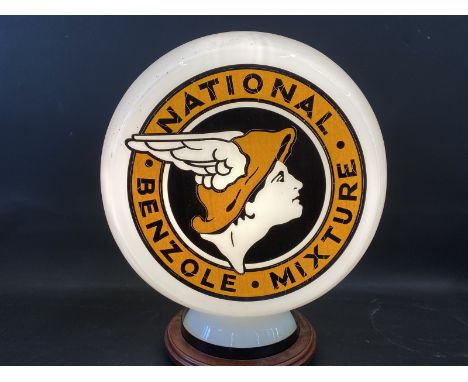 A reproduction National Benzole Mixture three sided glass petrol pump globe. 