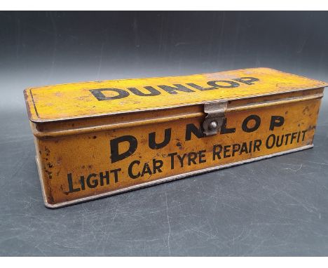 An early Dunlop 'light car repair outfit' tin with lid and clasp in good original condition, circa 1920s.