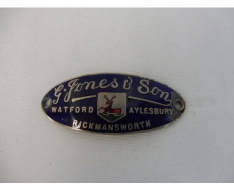 A blue enamel curved dash plaque for G. Jones &amp; Son Rickmansworth.