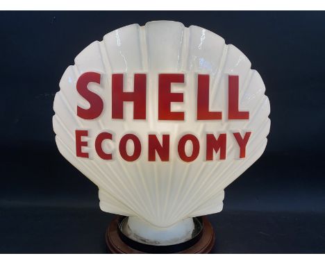 A Shell Economy glass petrol pump globe by Hailware, damage to neck and most pieces appear present, otherwise good. 