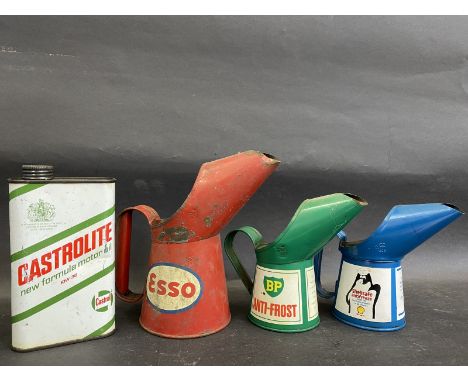 An Esso pint measure, two half pint measures, BP Anti-Frost and Shellsafe plus a Castrolite pint can. 