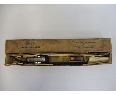 A boxed Barnache Engine Oil Gauge.