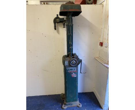 A Bowser Red Sentry hand operated petrol pump, in very sound original condition.