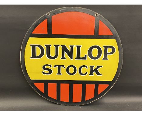 A Dunlop Stock circular double sided enamel sign, 23 3/4" diameter. 