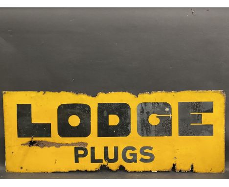 A Lodge Plugs rectangular enamel sign, 48 x 18". 