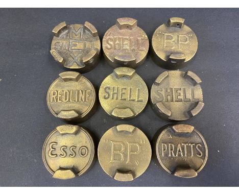 Nine 2 gallon petrol can caps including Redline. 