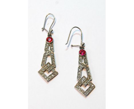 Pair of 1930s drop earrings, each with a collet-set synthetic ruby and rose diamonds, in white gold, 4.3g. 