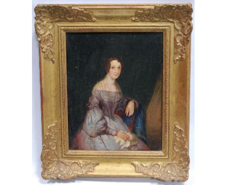 MID 19TH CENTURY SCHOOL Portrait of a lady, Oil on panel, 25.5cm x 20.5cm.CONDITION REPORT: Picture has been touched up in ar