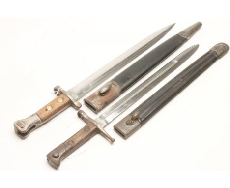 A BRITISH M1888 BAYONET, by Sanderson, Sheffield, with 12" double edged blade and leather scabbard, 17 1/2" long, together wi