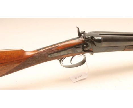 A COGSWELL & HARRISON 12 BORE HAMMER SHOTGUN, c.1883, the 28" barrels with brass front bead, scroll etched action inscribed w