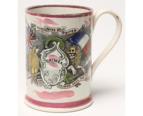 A MID VICTORIAN SUNDERLAND LUSTRE POTTERY FROG MUG, printed in underglaze black and naively overpainted in colours to commemo