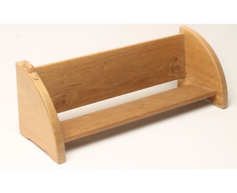 AN OAK BOOK TROUGH by Colin Almack, of oblong form with quadrant ends, carved beaver trademark in high relief, 21 3/4" x 7 3/
