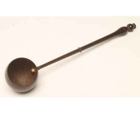 A GEORGIAN TREEN TODDY LADLE, late 18th century, with finely turned ring and baluster handle and coconut bowl, 14 1/2" wide (