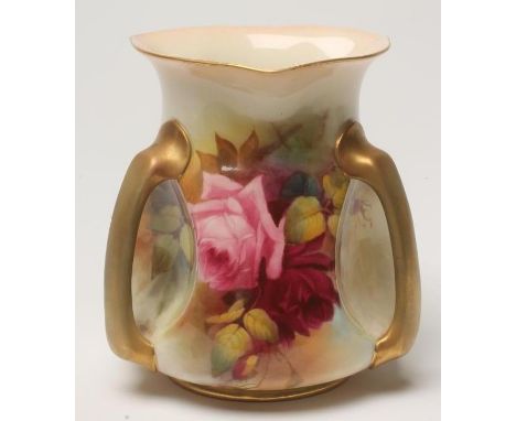 A ROYAL WORCESTER CHINA VASE, 1912, of rounded tapering cylindrical form with trefoil rim and three concave panels with loop 