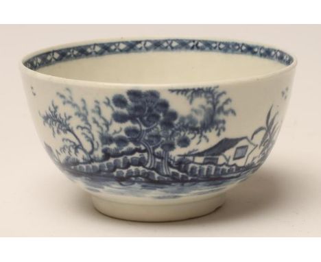 A FIRST PERIOD WORCESTER PORCELAIN SMALL BOWL, c.1795, painted in underglaze blue with the "Rock Strata Island" pattern, scri