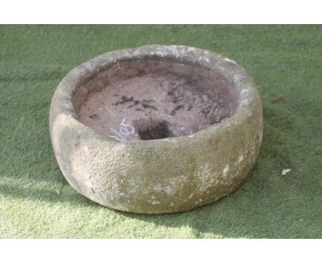 A SANDSTONE TROUGH of fine cut circular form, 22 1/2" x 8 3/4"  (Est. plus 18% premium inc. VAT) (Illustrated)