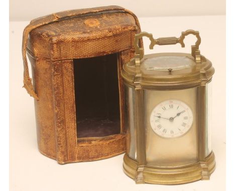 A BRASS CASED CARRIAGE CLOCK, the twin barrel repeater movement with platform escapement striking on a gong, white enamel dia