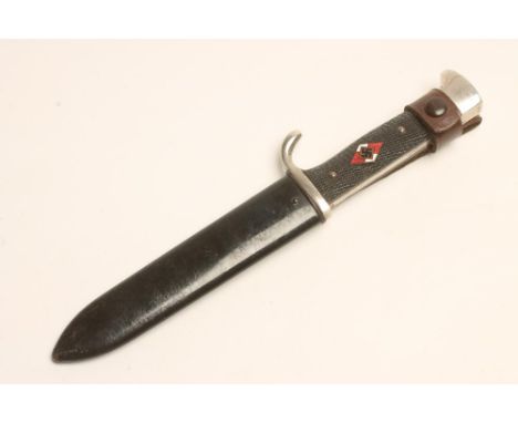 A GERMAN HITLER YOUTH DAGGER, the 5 1/4" blade inscribed "Blut und Ehre!" and stamped with maker's marks for Carl Eickhorn, w