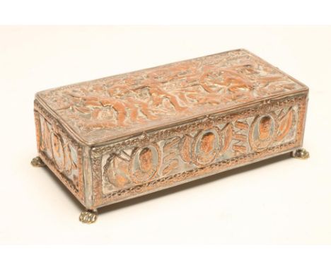A FIRST WORLD WAR R. CATON WOODVILLE CIGARETTE BOX, after Rudyard Kipling, with embossed decoration on lion paw feet, 7 3/4" 