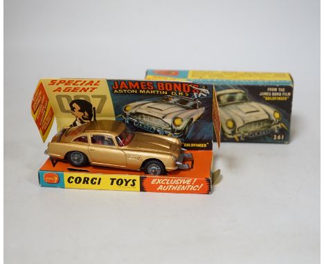 Corgi Toys James Bond's Aston Martin (261) in gold, boxed with driver, passenger, inner display tray, correct leaflet adverti