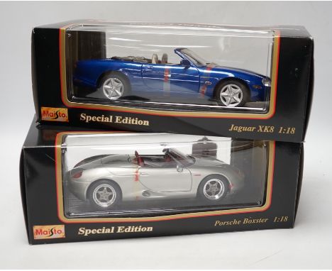 Five boxed Maisto 1:18 model cars; Porsche Boxster, Ferrari 550 maranello, Jaguar XK8, Dodge Concept vehicle and a Jaguar XJ2