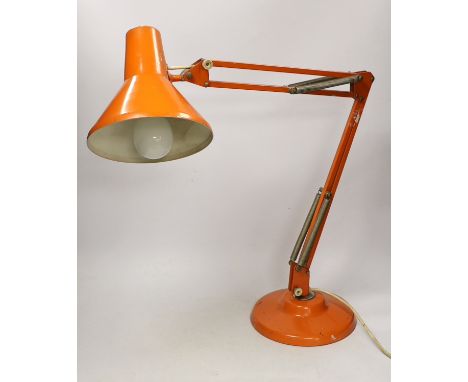 An orange Thousand and One Lamps Ltd angle poise lamp, approximately 76cm high