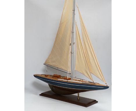 Two pond yachts, a yacht model and part of a Noah's Ark, longest hull 61cm