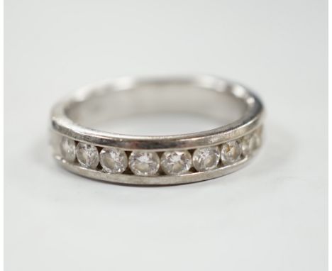 A modern Iliana 18ct white gold and nine stone channel set diamond half eternity ring, size R, gross weight 7.7 grams.