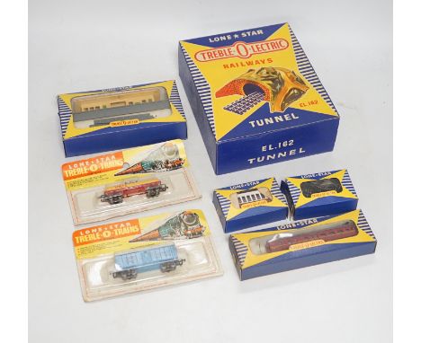 Sixty-two boxed items of Lone Star 000 gauge model railway including; a tunnel, Brake End Coaches, bogie wagons, station plat