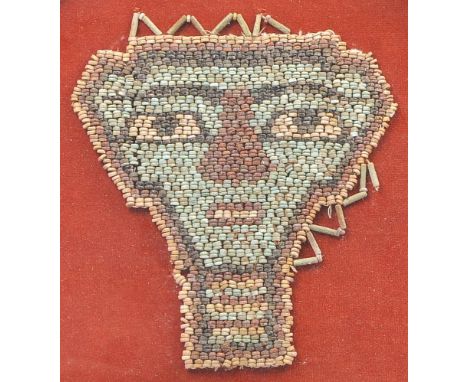 Ancient Egypt - An Egyptian beaded mummy mask dating from the third intermediate period 1000 BC, constructed as a strung pane