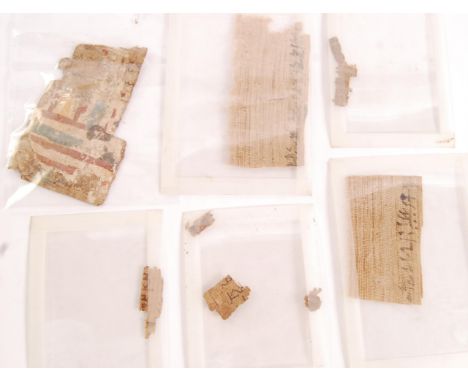 Ancient Egypt - A collection of believed late period Egyptian artifacts to include linen mummy wrappings inscribed with hiero