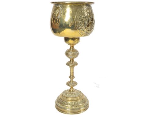 A 19th Century Victorian gilt brass planter on stand having repose relief decoration. Raised on a stepped circular base with 
