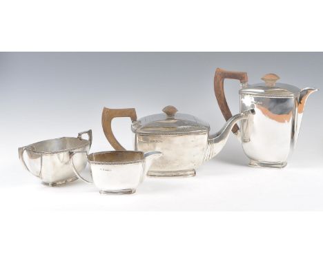 A 20th Century 1940's silver hallmarked coffee and tea service comprising a teapot, coffee / water pot, twin handled sugar bo