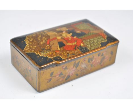 A 19th Century Qajar lacquer papier mache snuff box of rectangular form having hinged lid decorated with three gentleman. The