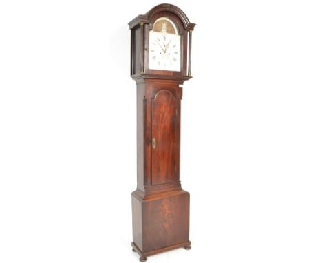 An 18th Century George III mahogany cased longcase grandfather clock by John Pollard. The flame mahogany trunk raised on bun 