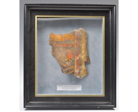 Ancient Egypt - a fragment of an Egyptian sarcophagus, constructed from gesso on linen, painted in black red and blue depicti
