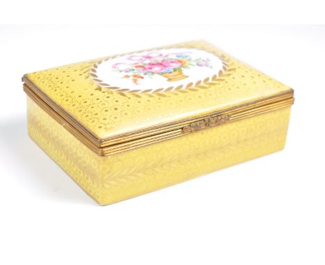A 19th Century French porcelain casket box possibly Sevres or Limoges having a yellow ground with gilt roundel medallions and