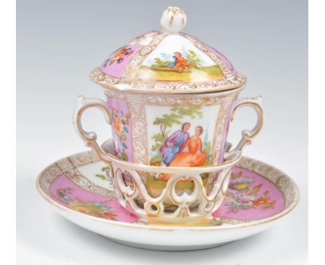 A 19th Century&nbsp;Dresden trembleuse&nbsp;chocolate cup with lid and trembleuse saucer, of twin handled form each painted w