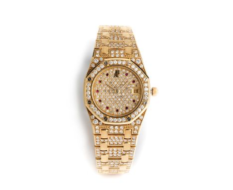 Damenuhr von AUDEMARS PIGUET in Gold &amp; BrillantenFeine Damenuhr von AUDEMARS PIGUET in 18 kt. Gold in einem oktagonalen G