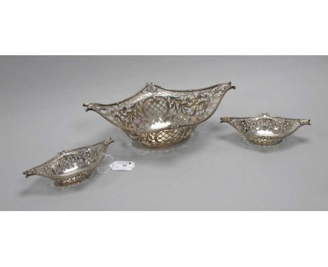 A Set of Three Decorative Hallmarked Silver Dessert Baskets, Messrs Hutton, Sheffield 1909, each of shaped form, allover foli
