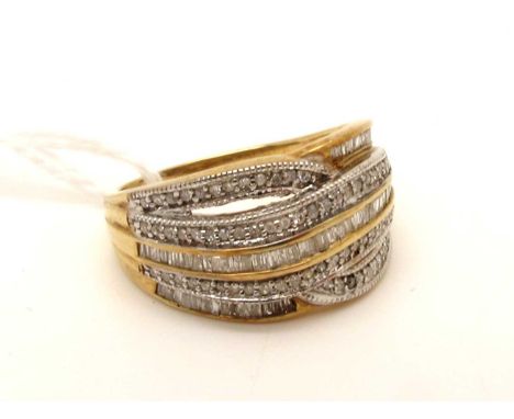 A Modern TGGC 9ct Gold Diamond Set Dress Ring, of multi row design, channel and millegrain set (finger size P).