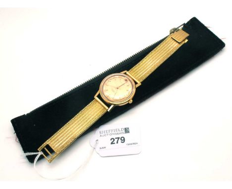 Longines; A Vintage Conquest Automatic Gent's Wristwatch, the signed dial with block markers, centre seconds and date apertur