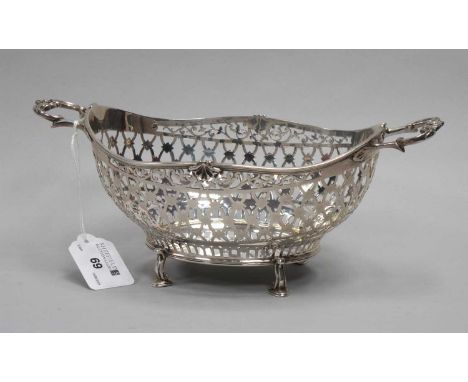 An Early XX Century Decorative Hallmarked Silver Twin Handled Basket, Messrs Hutton, Sheffield 1919, of geometric pierced des