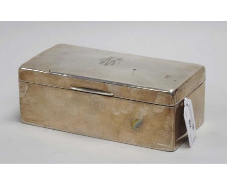 A Hallmarked Silver Cigarette Box, R&amp;S, Chester 1933, of plain rectangular form, monogrammed, 17.5cm wide.