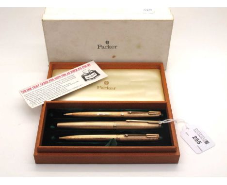 Parker; A 9ct Gold Three Piece Pen / Pencil Set, each with allover engine turned decoration, London 1963 and 1964 (the founta