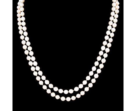 A two row cultured pearl necklace, the 6.3mm pearls (63), (68) knotted every pearl into a two row necklace 53cm long, fitted 